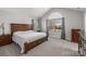 Spacious bedroom with large window and hardwood floors at 874 Ledgestone Ct, Fort Mill, SC 29708