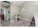 Bright dining area with hardwood floors and modern light fixture at 874 Ledgestone Ct, Tega Cay, SC 29708