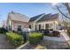 Stone and shingle exterior with a patio, grill, and walkway at 874 Ledgestone Ct, Tega Cay, SC 29708