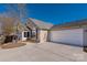 Exterior view of house with attached garage at 874 Ledgestone Ct, Tega Cay, SC 29708