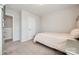 Well-lit bedroom featuring plush carpeting and ample closet space at 970 Bunker Trce, Rock Hill, SC 29730