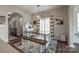 Farmhouse-style dining area with wooden table and bench seating at 970 Bunker Trce, Rock Hill, SC 29730