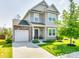 Two-story house with gray siding, stone accents, and a landscaped lawn at 970 Bunker Trce, Rock Hill, SC 29730