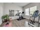 Bright home gym with various exercise equipment and large mirror at 970 Bunker Trce, Rock Hill, SC 29730