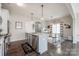 Open concept kitchen with island, stainless steel appliances, and white cabinetry at 970 Bunker Trce, Rock Hill, SC 29730