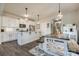 Bright kitchen features island, stainless steel appliances, and white cabinets at 970 Bunker Trce, Rock Hill, SC 29730