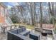 Relaxing backyard with patio furniture and fire pit at 9929 Allyson Park Dr, Charlotte, NC 28277