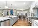 Modern kitchen with stainless steel appliances and an island at 9929 Allyson Park Dr, Charlotte, NC 28277