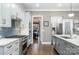 Modern kitchen with stainless steel appliances and a large island at 9929 Allyson Park Dr, Charlotte, NC 28277