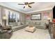 Large living room with sectional sofa and cozy atmosphere at 9929 Allyson Park Dr, Charlotte, NC 28277