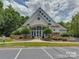 Community center with large windows and stone accents at 100 S Centurion Ln, Mount Holly, NC 28120