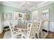 Formal dining room with a large table, chandelier, and decorative accents at 100 S Centurion Ln, Mount Holly, NC 28120