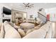 Bright living room showcasing hardwood floors, a fireplace, and ample natural light at 100 S Centurion Ln, Mount Holly, NC 28120