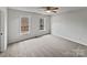 Well-lit bedroom with neutral walls and carpet flooring at 1002 Joanne Ct, Kings Mountain, NC 28086