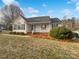 Ranch style home with front porch and landscaping at 1002 Joanne Ct, Kings Mountain, NC 28086