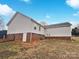 Brick foundation and vinyl siding on the side of the house at 1002 Joanne Ct, Kings Mountain, NC 28086