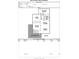 Detailed floor plan showcasing the layout of the first floor, including kitchen, sunroom, and living areas at 1003 W 4Th Ave, Gastonia, NC 28052