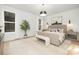 Spacious bedroom with large windows and neutral decor at 10517 S Hampton Dr, Charlotte, NC 28227