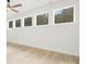 Bedroom featuring hardwood floors and multiple windows at 10517 S Hampton Dr, Charlotte, NC 28227