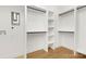 Spacious closet with shelves and hanging rods at 10517 S Hampton Dr, Charlotte, NC 28227