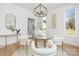 Elegant dining room with glass table and natural light at 10517 S Hampton Dr, Charlotte, NC 28227