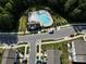 Community pool and surrounding townhomes from above at 11005 Woodland Creek Way, Charlotte, NC 28262