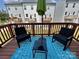 Relaxing deck with seating and view of townhomes at 11005 Woodland Creek Way, Charlotte, NC 28262