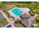 Aerial view of community pool, playground, and clubhouse at 11021 Ogden Ln, Charlotte, NC 28278