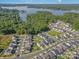 Aerial view of community and lakefront at 11021 Ogden Ln, Charlotte, NC 28278