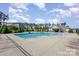 Community pool with a separate kiddie pool and a pool house at 11021 Ogden Ln, Charlotte, NC 28278