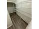 Walk-in pantry with wire shelving at 11021 Ogden Ln, Charlotte, NC 28278