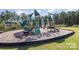 Community playground with slides, climbing structures, and a soft surface at 11021 Ogden Ln, Charlotte, NC 28278