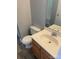 Bathroom featuring wood-look flooring and modern fixtures at 11124 Northwoods Forest Dr, Charlotte, NC 28214