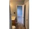 Bathroom featuring wood-look flooring and modern fixtures at 11124 Northwoods Forest Dr, Charlotte, NC 28214