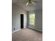 Bedroom featuring natural light from the window at 11124 Northwoods Forest Dr, Charlotte, NC 28214