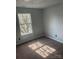 Bedroom featuring natural light from the window at 11124 Northwoods Forest Dr, Charlotte, NC 28214