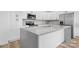 Modern kitchen island with white cabinets and granite countertops at 113 Brentwood Dr, Maiden, NC 28650