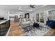 Spacious living room with open floor plan, modern furnishings, and access to an outdoor deck at 113 Brentwood Dr, Maiden, NC 28650