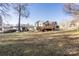 Expansive backyard with shed and deck view of home at 1224 Castlegate St, Gastonia, NC 28054