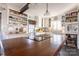 Bright kitchen features ample cabinetry, a center island with cooktop, and open shelving at 1224 Castlegate St, Gastonia, NC 28054