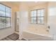 Bathroom with a bathtub and a separate shower at 12338 Shadow Ridge Ln, Charlotte, NC 28273