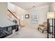 Bright foyer with staircase, neutral color, and natural light at 12338 Shadow Ridge Ln, Charlotte, NC 28273