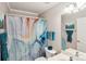 Clean bathroom with shower/tub combo and updated vanity at 12710 Winding Ridge Rd, Huntersville, NC 28078