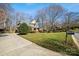 Two-story house with a large front yard and driveway at 12710 Winding Ridge Rd, Huntersville, NC 28078