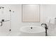 Luxurious bathroom with a freestanding tub and walk-in shower at 130 Cherokee Rd # 403, Charlotte, NC 28207