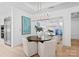 Modern dining area with round table and statement art at 130 Cherokee Rd # 403, Charlotte, NC 28207