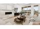 Living area with fireplace, large windows, and city views at 130 Cherokee Rd # 403, Charlotte, NC 28207