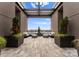 Private rooftop patio with seating area and city views at 130 Cherokee Rd # 403, Charlotte, NC 28207