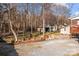 Large backyard with shed and wooded area at 1325 Bostwood Ln, Concord, NC 28025