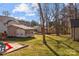 Backyard with shed, sandbox and open space at 1325 Bostwood Ln, Concord, NC 28025